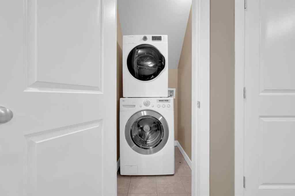 MLS® A2264015 - 87 Baysprings Way SW in Baysprings Airdrie, Residential