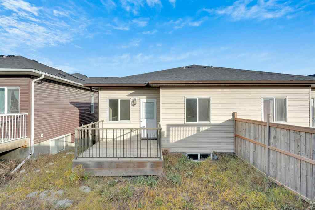MLS® A2264015 - 87 Baysprings Way SW in Baysprings Airdrie, Residential