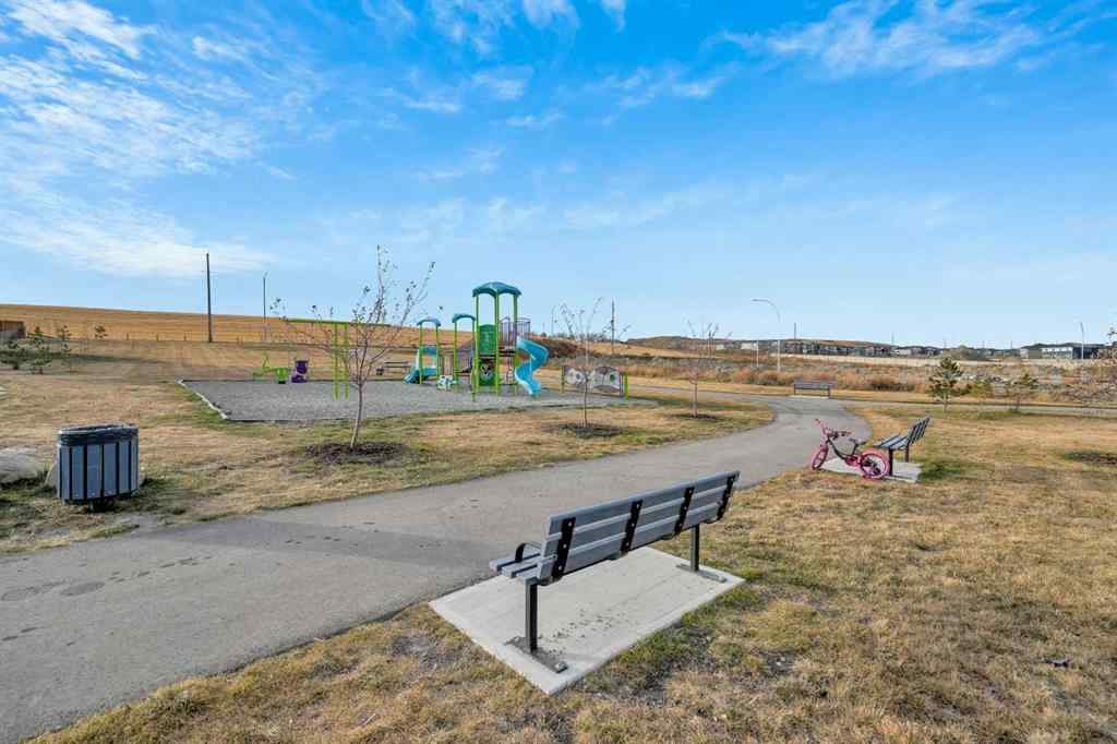 MLS® A2264015 - 87 Baysprings Way SW in Baysprings Airdrie, Residential