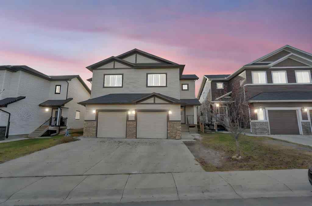 MLS® A2264015 - 87 Baysprings Way SW in Baysprings Airdrie, Residential