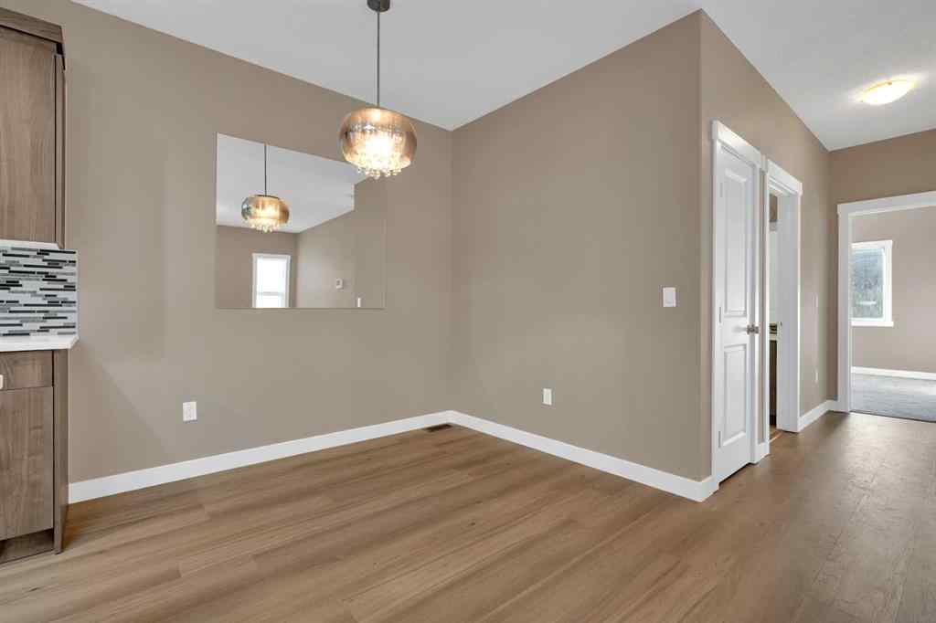 MLS® A2264015 - 87 Baysprings Way SW in Baysprings Airdrie, Residential