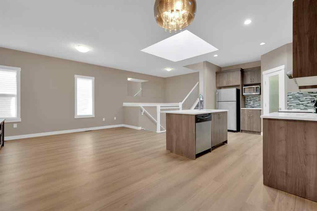 MLS® A2264015 - 87 Baysprings Way SW in Baysprings Airdrie, Residential