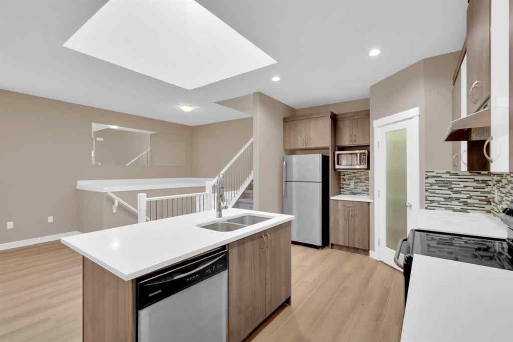 MLS® A2264015 - 87 Baysprings Way SW in Baysprings Airdrie, Residential