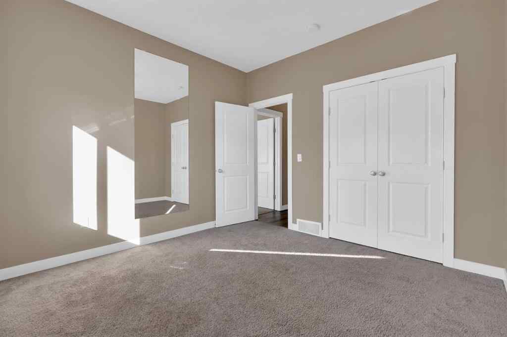 MLS® A2264015 - 87 Baysprings Way SW in Baysprings Airdrie, Residential