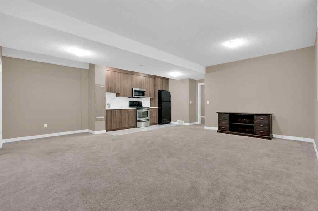 MLS® A2264015 - 87 Baysprings Way SW in Baysprings Airdrie, Residential