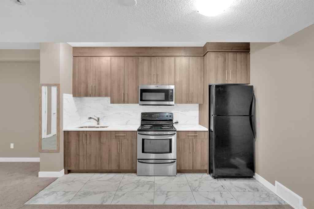 MLS® A2264015 - 87 Baysprings Way SW in Baysprings Airdrie, Residential