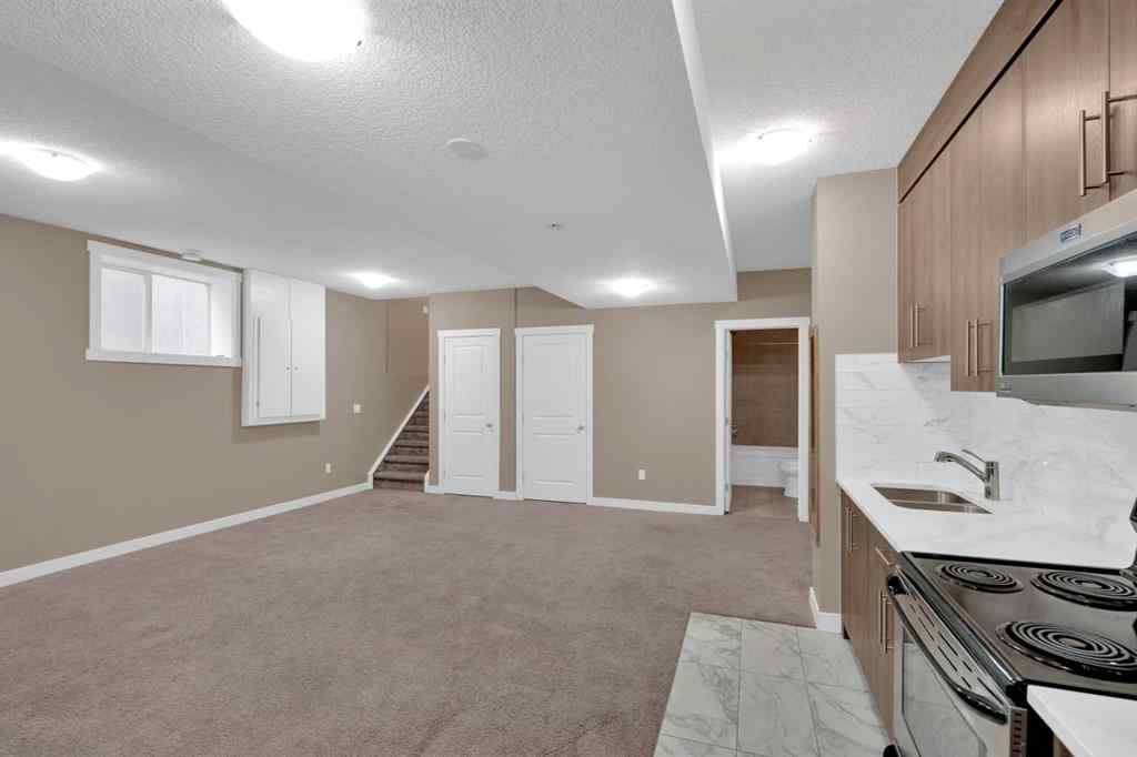 MLS® A2264015 - 87 Baysprings Way SW in Baysprings Airdrie, Residential