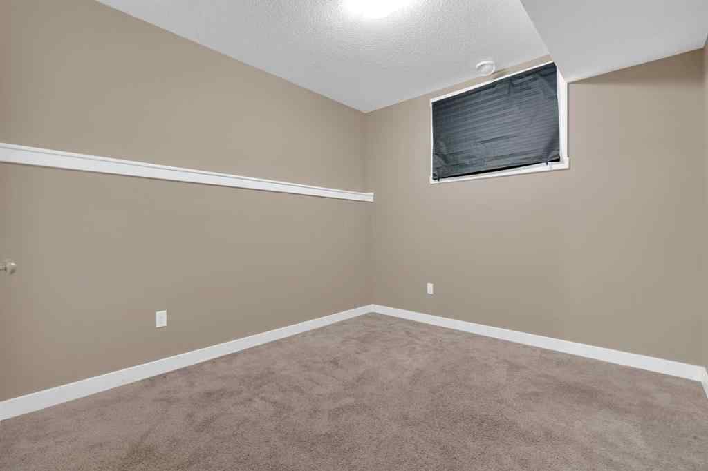 MLS® A2264015 - 87 Baysprings Way SW in Baysprings Airdrie, Residential