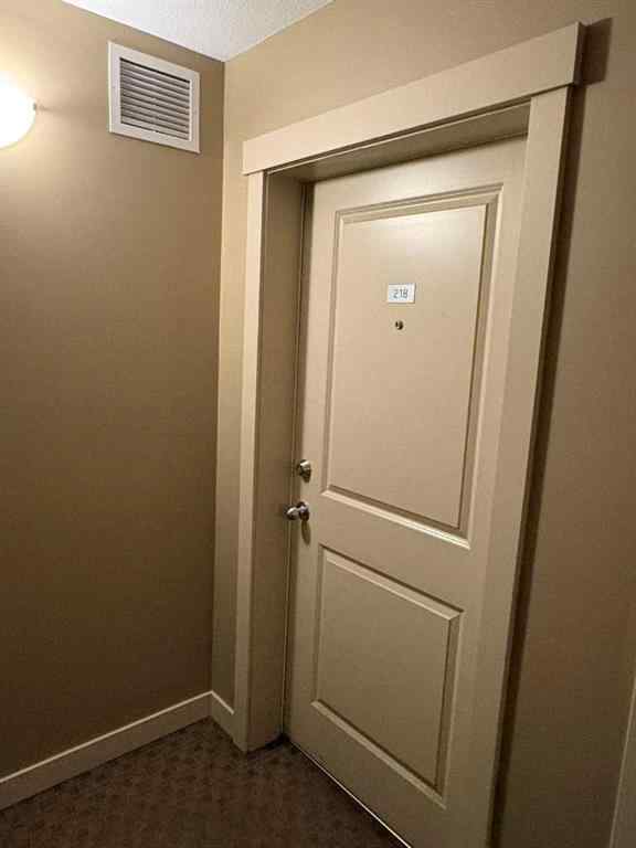 MLS® A2264022 - Unit #218 5 Saddlestone Way NE in Saddle Ridge Calgary, Residential