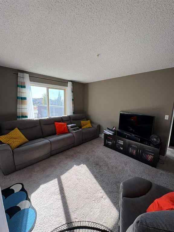 MLS® A2264022 - Unit #218 5 Saddlestone Way NE in Saddle Ridge Calgary, Residential
