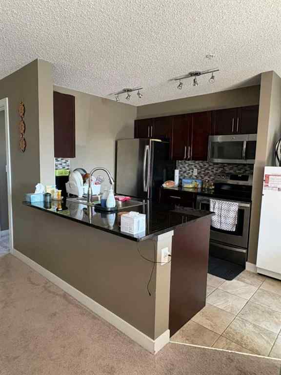 MLS® A2264022 - Unit #218 5 Saddlestone Way NE in Saddle Ridge Calgary, Residential