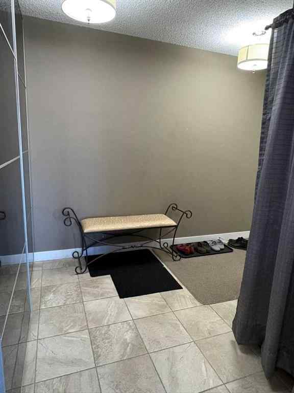 MLS® A2264022 - Unit #218 5 Saddlestone Way NE in Saddle Ridge Calgary, Residential