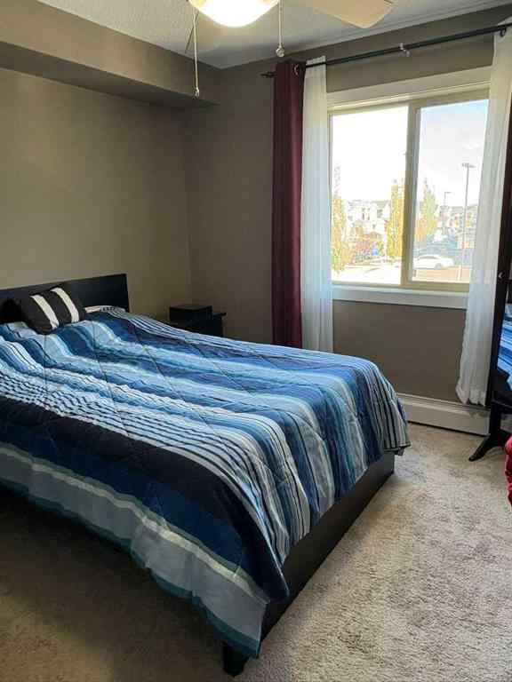 MLS® A2264022 - Unit #218 5 Saddlestone Way NE in Saddle Ridge Calgary, Residential