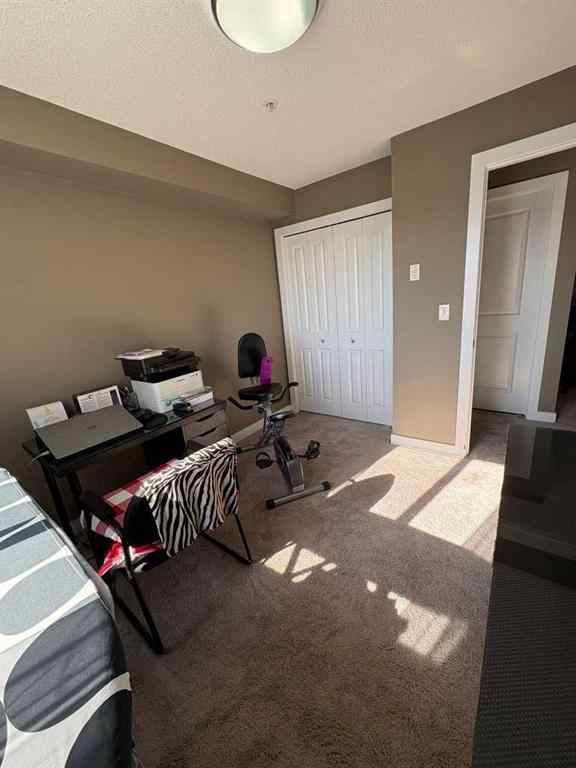 MLS® A2264022 - Unit #218 5 Saddlestone Way NE in Saddle Ridge Calgary, Residential