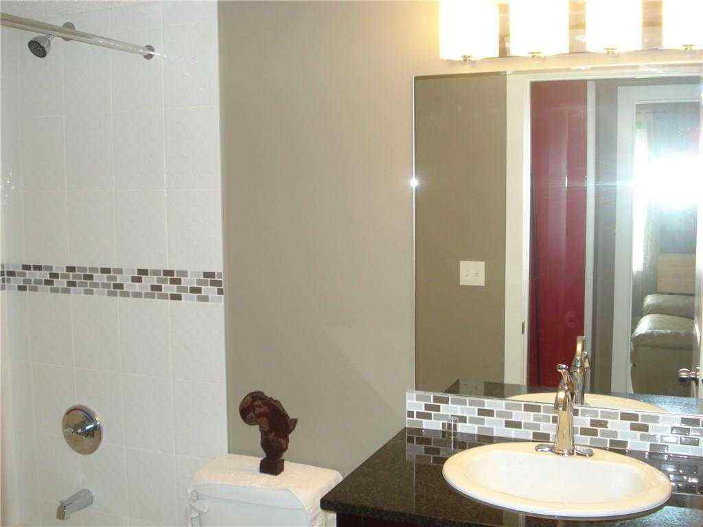 MLS® A2264022 - Unit #218 5 Saddlestone Way NE in Saddle Ridge Calgary, Residential