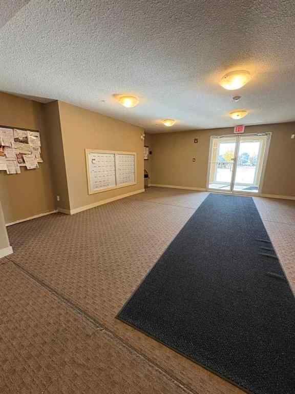 MLS® A2264022 - Unit #218 5 Saddlestone Way NE in Saddle Ridge Calgary, Residential