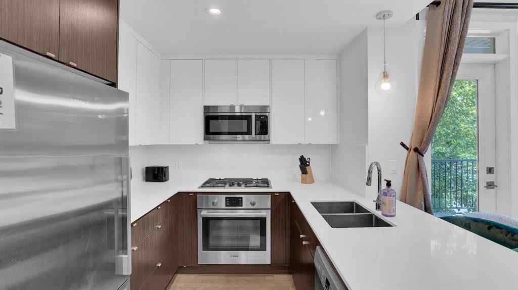 MLS® A2264024 - Unit #212 305 18 Avenue SW in Mission Calgary, Residential