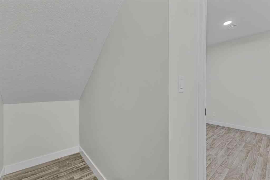 MLS® A2264027 - 33 BELMONT Drive SW in Belmont Calgary, Residential