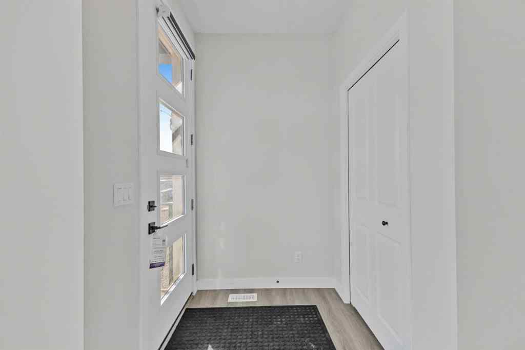 MLS® A2264027 - 33 BELMONT Drive SW in Belmont Calgary, Residential