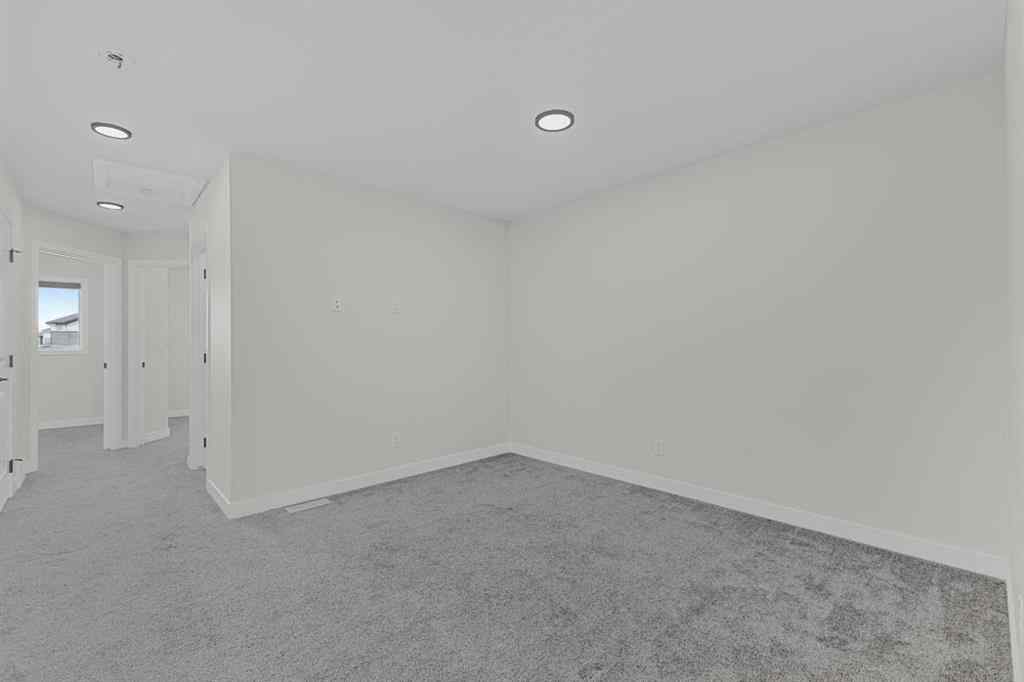 MLS® A2264027 - 33 BELMONT Drive SW in Belmont Calgary, Residential