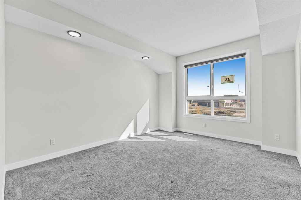 MLS® A2264027 - 33 BELMONT Drive SW in Belmont Calgary, Residential