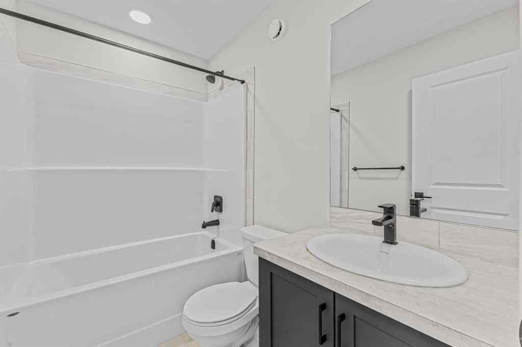 MLS® A2264027 - 33 BELMONT Drive SW in Belmont Calgary, Residential