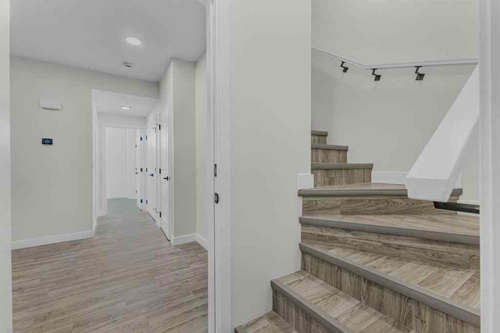 MLS® A2264027 - 33 BELMONT Drive SW in Belmont Calgary, Residential