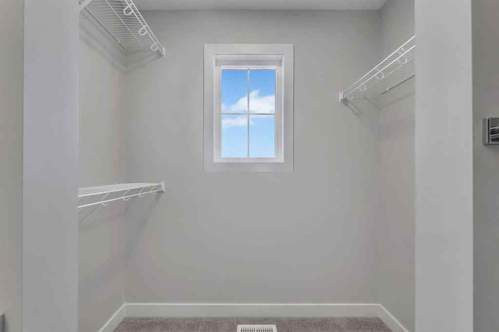 MLS® A2264031 - Unit #1205 Iron Ridge Avenue  in NONE Crossfield, Residential