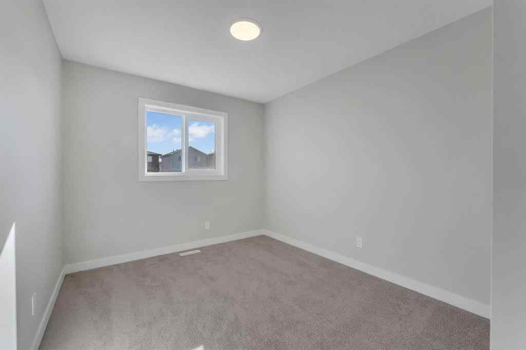 MLS® A2264031 - Unit #1205 Iron Ridge Avenue  in NONE Crossfield, Residential