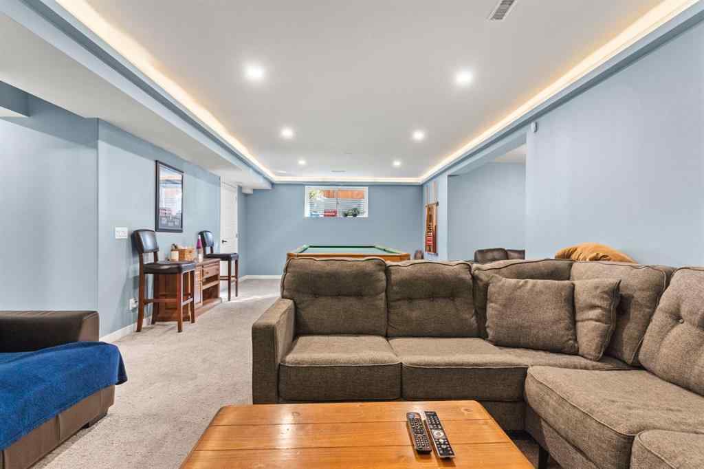 MLS® A2264040 - 498 Tuscany Ravine Road NW in Tuscany Calgary, Residential