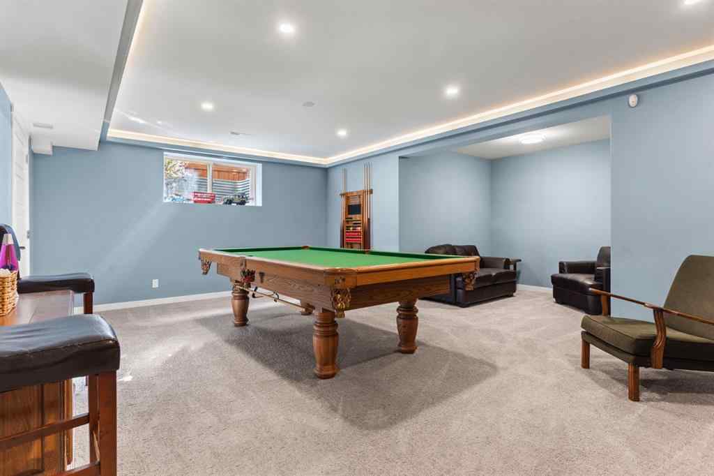 MLS® A2264040 - 498 Tuscany Ravine Road NW in Tuscany Calgary, Residential