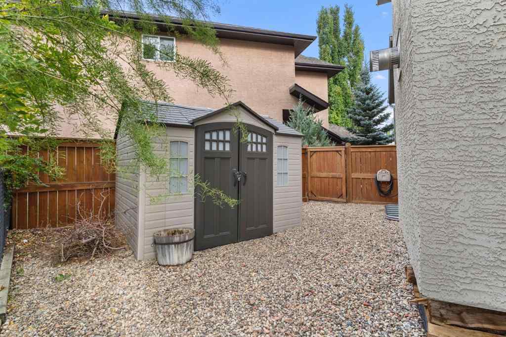 MLS® A2264040 - 498 Tuscany Ravine Road NW in Tuscany Calgary, Residential