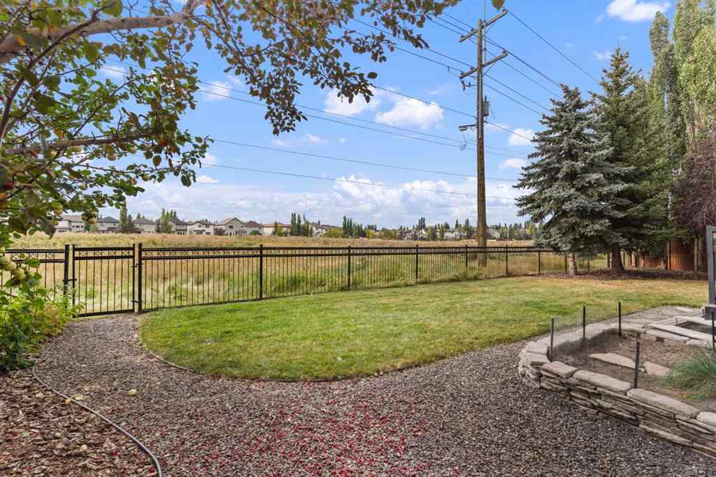 MLS® A2264040 - 498 Tuscany Ravine Road NW in Tuscany Calgary, Residential