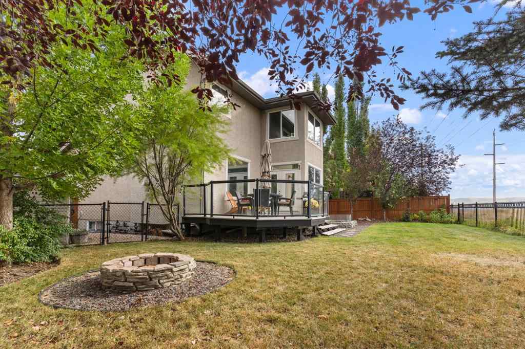 MLS® A2264040 - 498 Tuscany Ravine Road NW in Tuscany Calgary, Residential