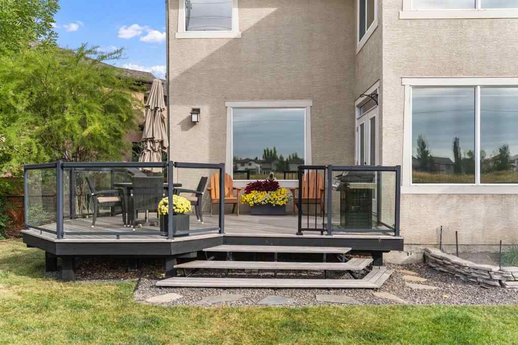 MLS® A2264040 - 498 Tuscany Ravine Road NW in Tuscany Calgary, Residential