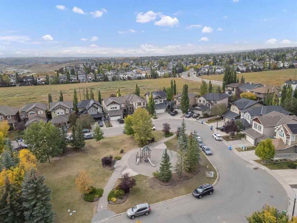 MLS® A2264040 - 498 Tuscany Ravine Road NW in Tuscany Calgary, Residential