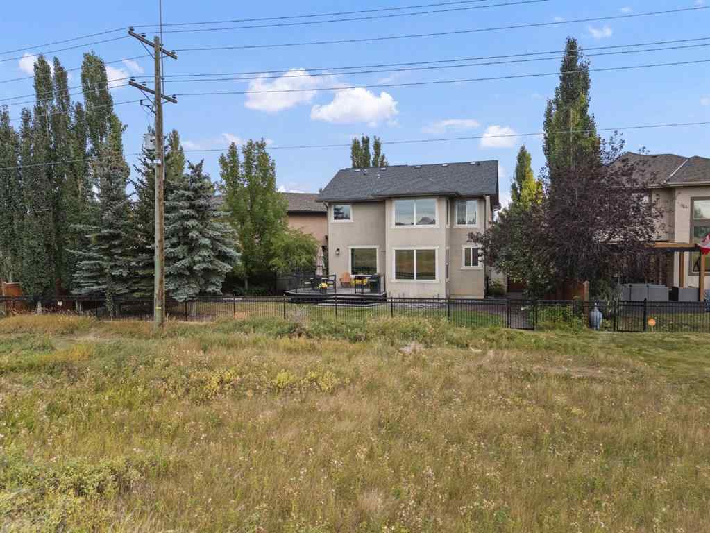 MLS® A2264040 - 498 Tuscany Ravine Road NW in Tuscany Calgary, Residential
