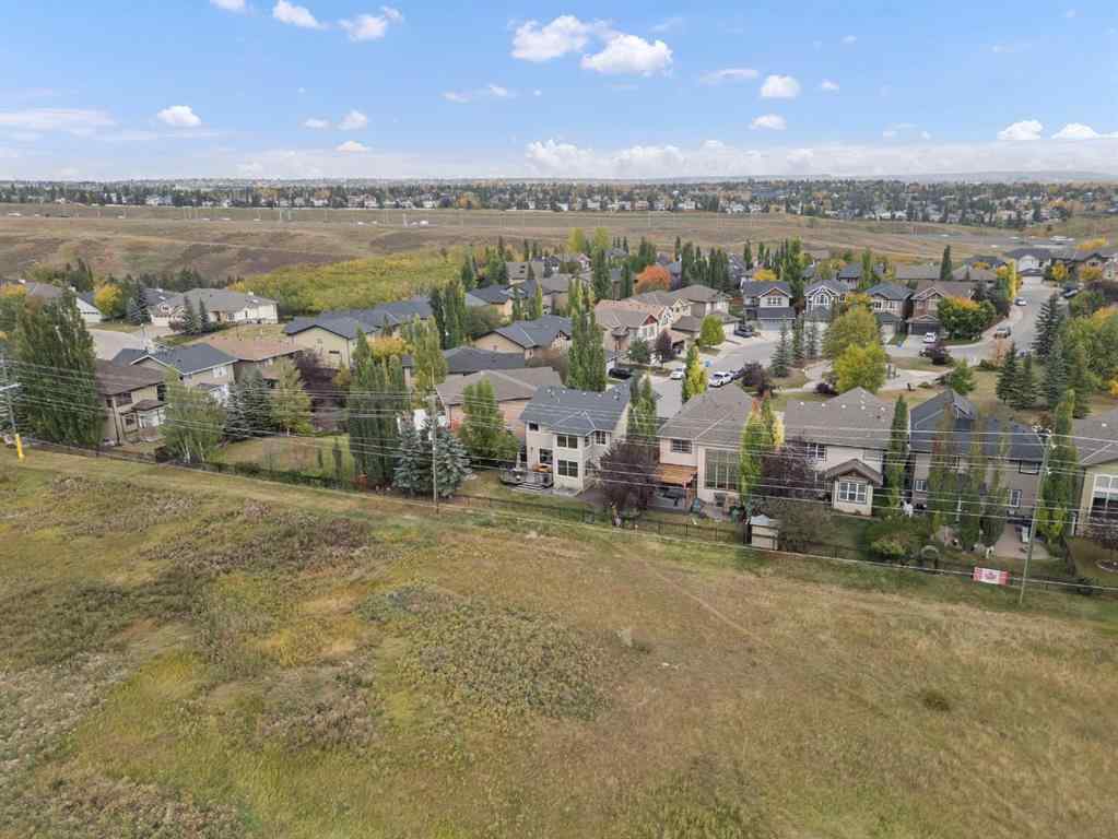 MLS® A2264040 - 498 Tuscany Ravine Road NW in Tuscany Calgary, Residential