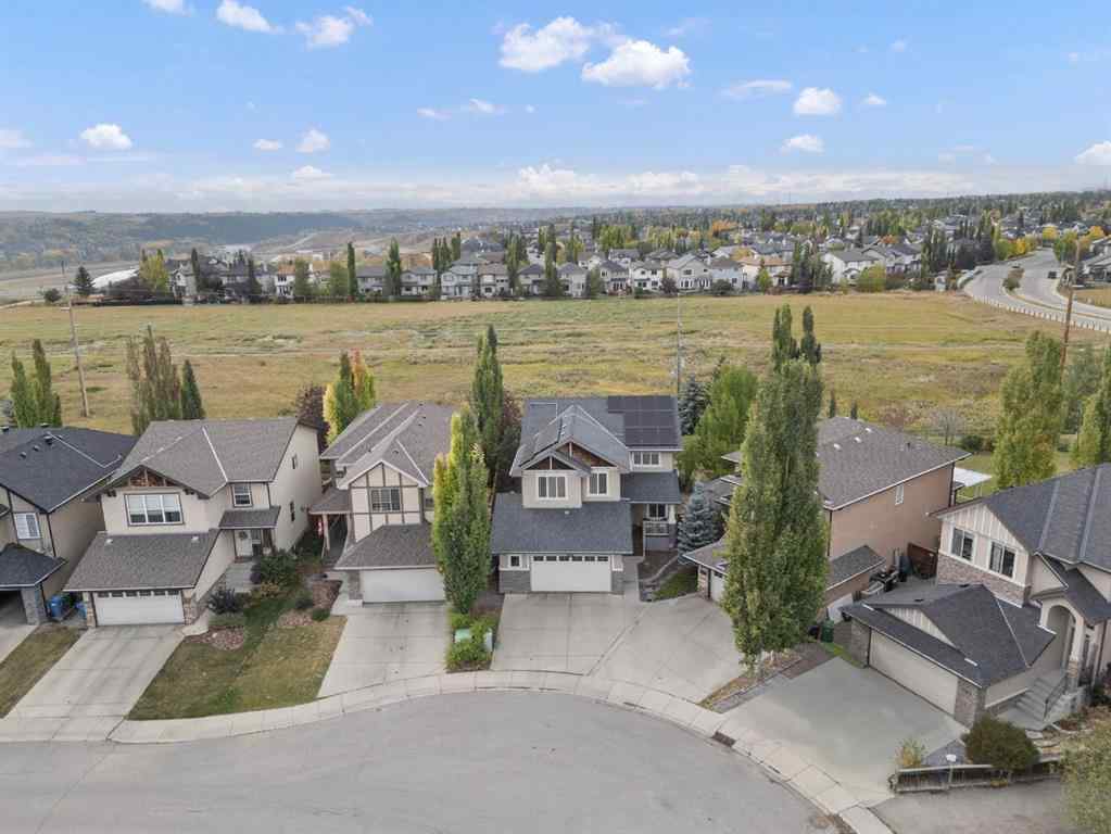 MLS® A2264040 - 498 Tuscany Ravine Road NW in Tuscany Calgary, Residential