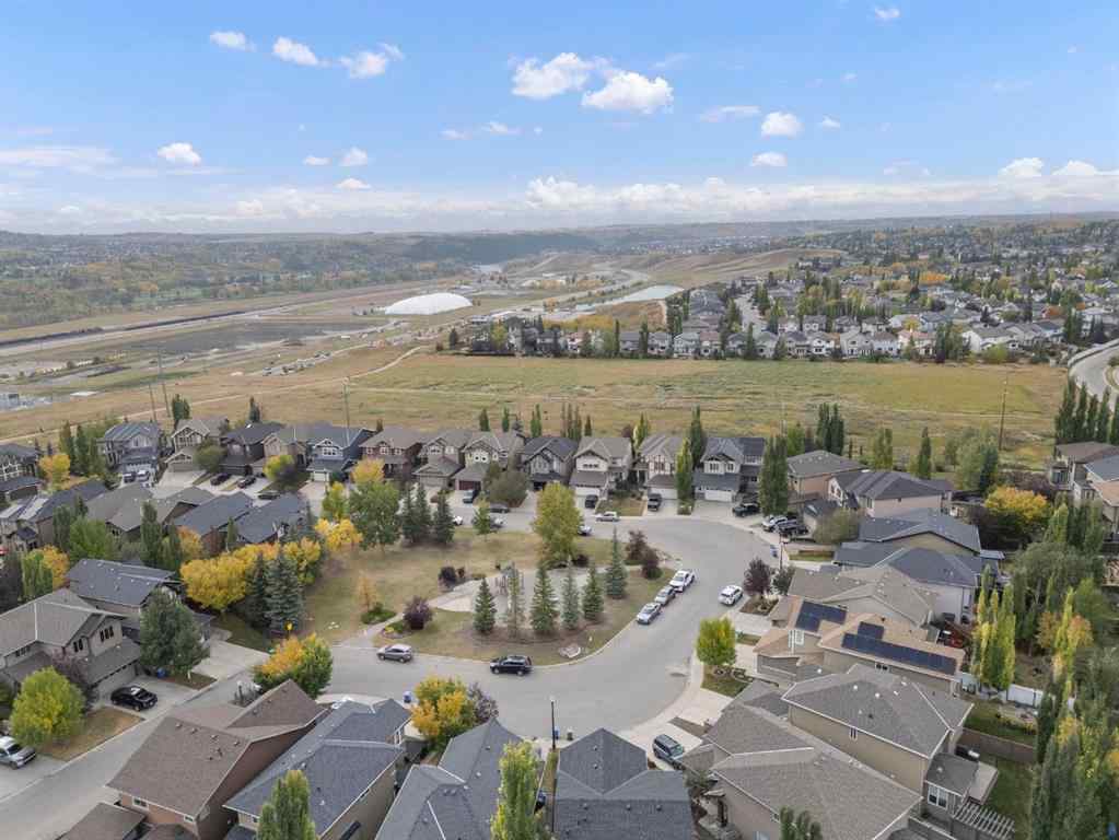 MLS® A2264040 - 498 Tuscany Ravine Road NW in Tuscany Calgary, Residential