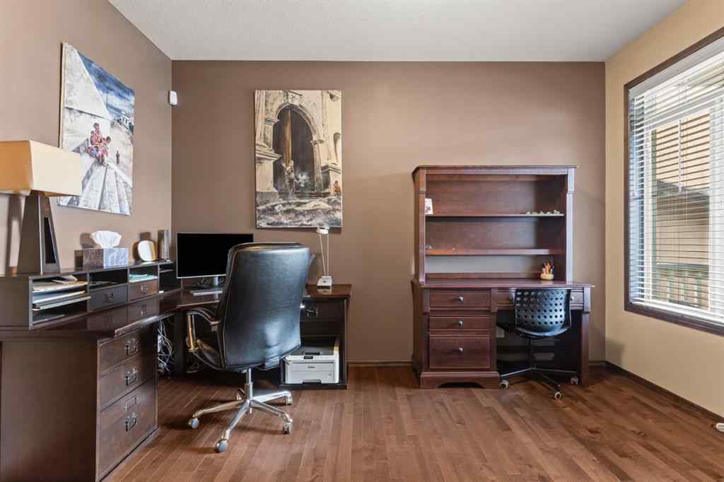 MLS® A2264040 - 498 Tuscany Ravine Road NW in Tuscany Calgary, Residential