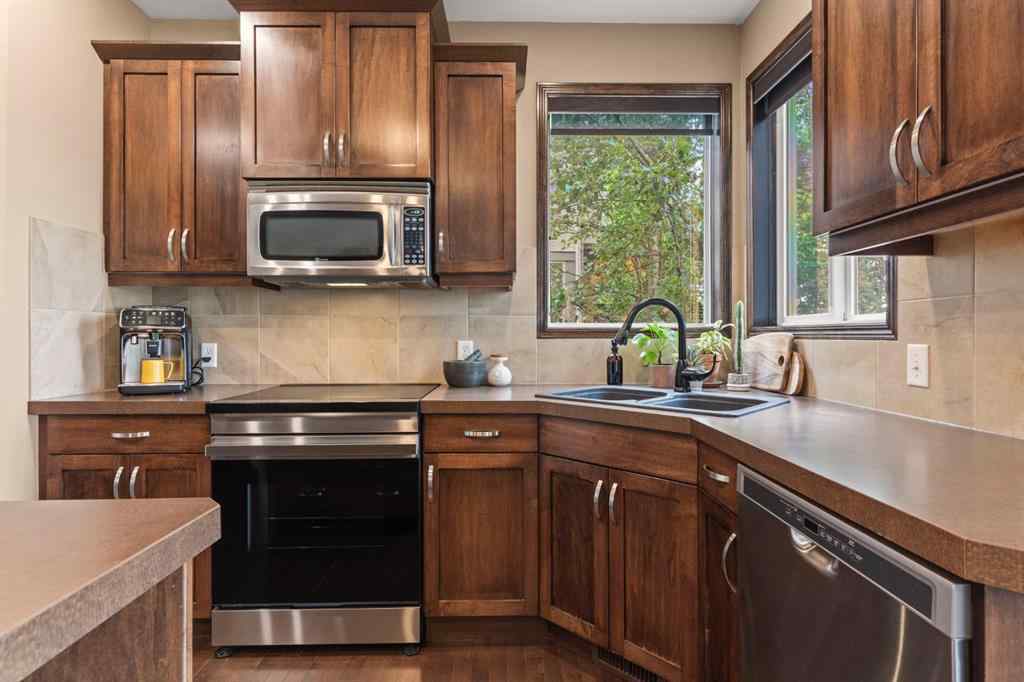 MLS® A2264040 - 498 Tuscany Ravine Road NW in Tuscany Calgary, Residential