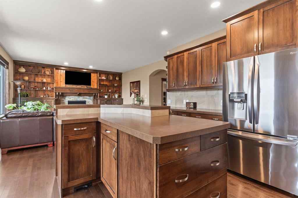 MLS® A2264040 - 498 Tuscany Ravine Road NW in Tuscany Calgary, Residential