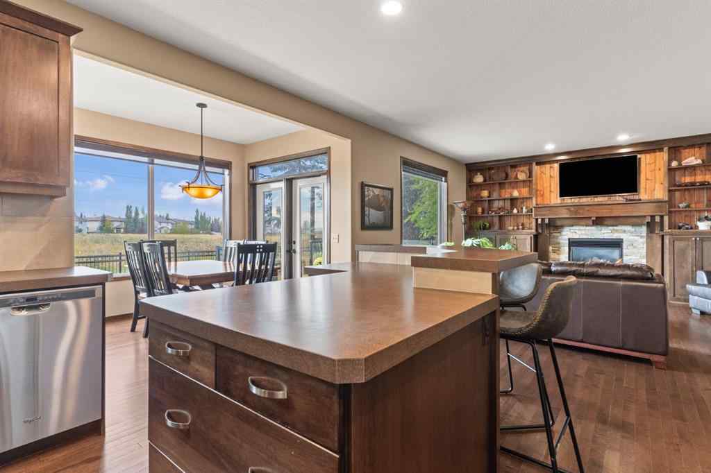 MLS® A2264040 - 498 Tuscany Ravine Road NW in Tuscany Calgary, Residential