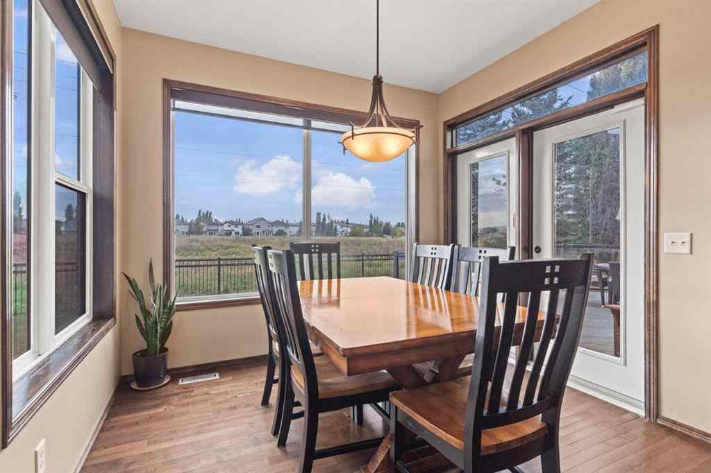 MLS® A2264040 - 498 Tuscany Ravine Road NW in Tuscany Calgary, Residential