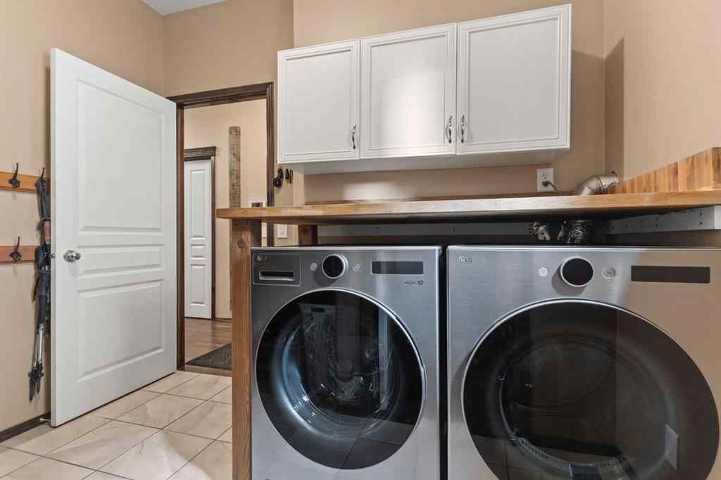 MLS® A2264040 - 498 Tuscany Ravine Road NW in Tuscany Calgary, Residential