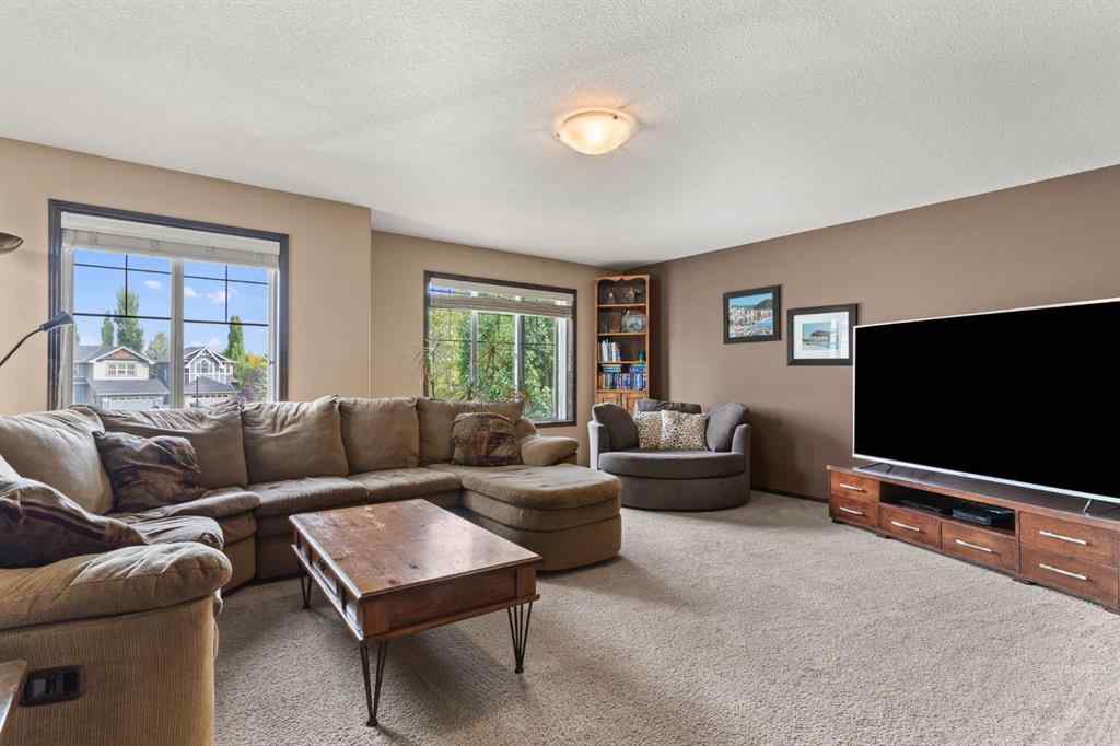 MLS® A2264040 - 498 Tuscany Ravine Road NW in Tuscany Calgary, Residential