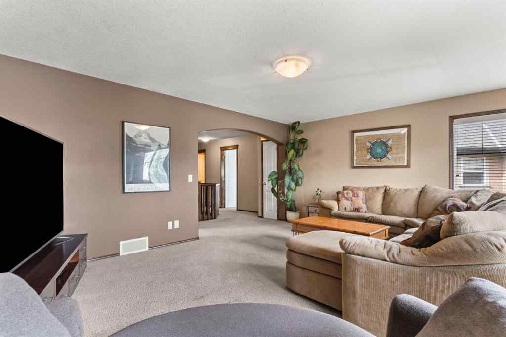 MLS® A2264040 - 498 Tuscany Ravine Road NW in Tuscany Calgary, Residential