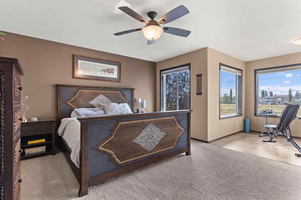 MLS® A2264040 - 498 Tuscany Ravine Road NW in Tuscany Calgary, Residential