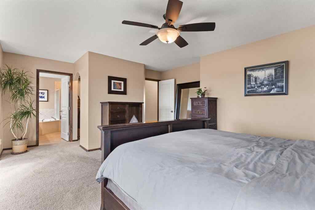 MLS® A2264040 - 498 Tuscany Ravine Road NW in Tuscany Calgary, Residential